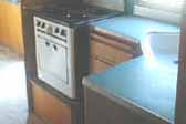 Photo of original blue formica kitchen countertop in 1948 Westcraft Westwood trailer